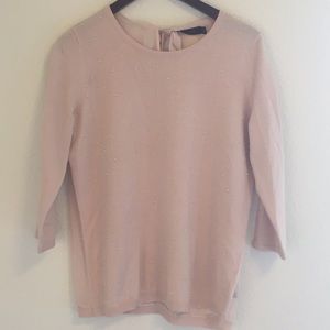 Sheer-back sweater with pearl accents